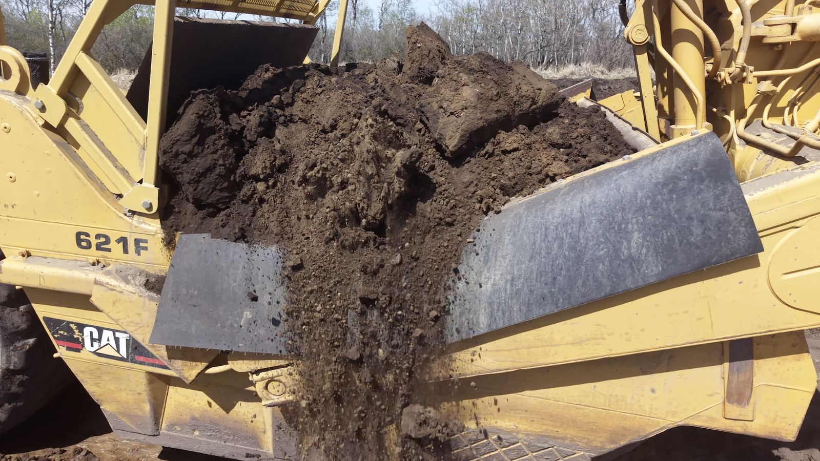 621 scraper stripping a gravel pit