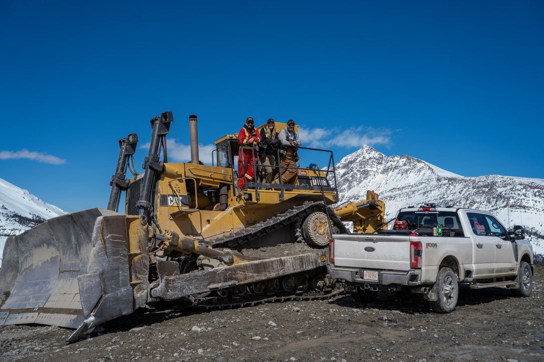 RTRC crew and Cat dozer on a mountain road project