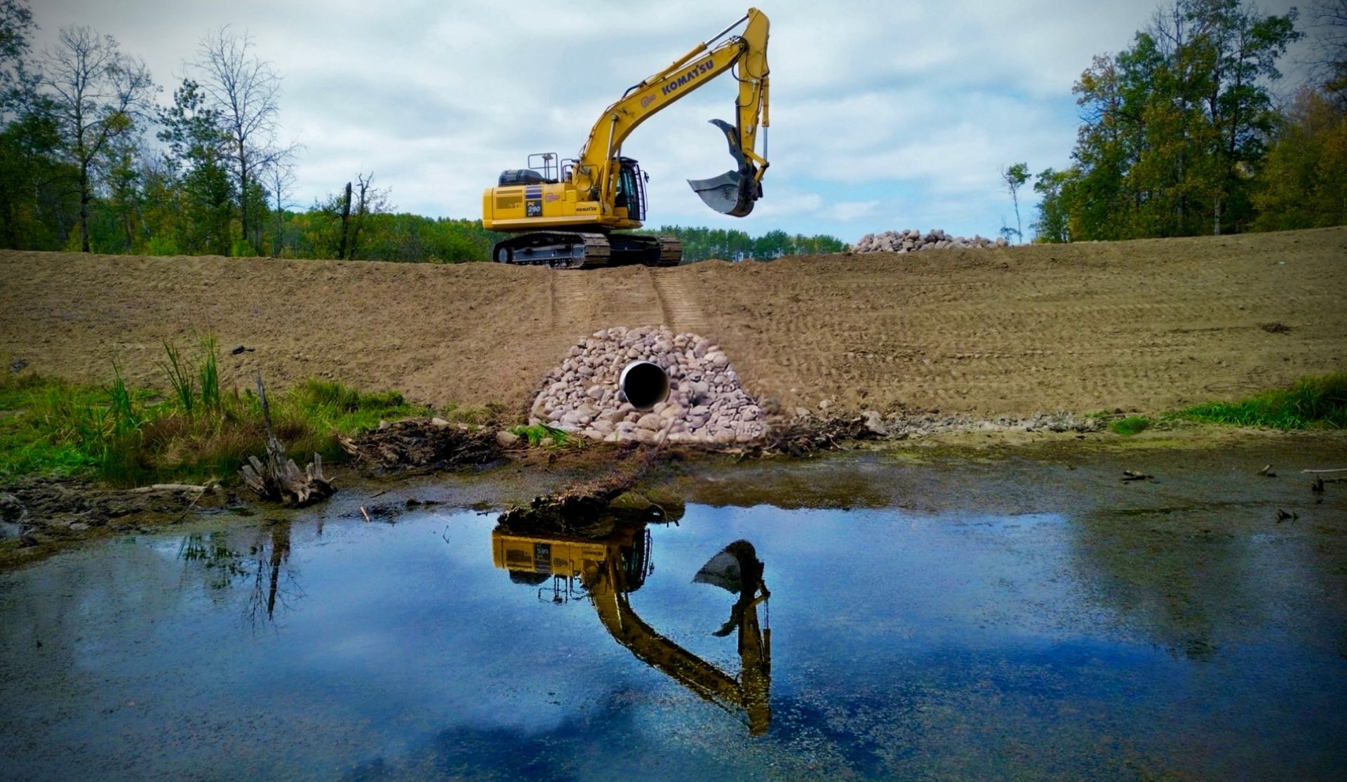 Completed culvert installation and drainage improvement