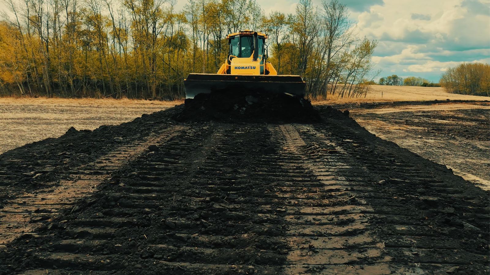 Dozer completing final contouring on a reclaimed lease