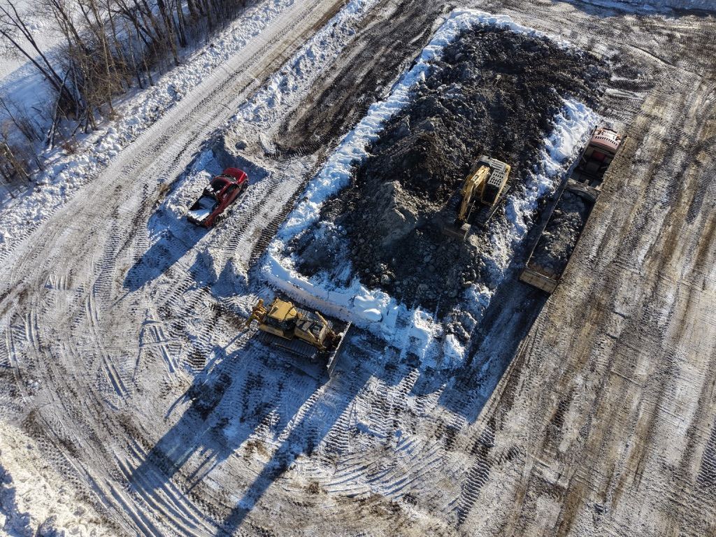 Hauling impacted soil from an environmental remediation site