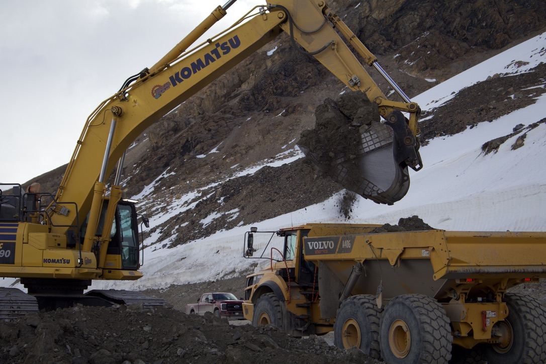 Komatsu excavator loading 40-tonne rock trucks