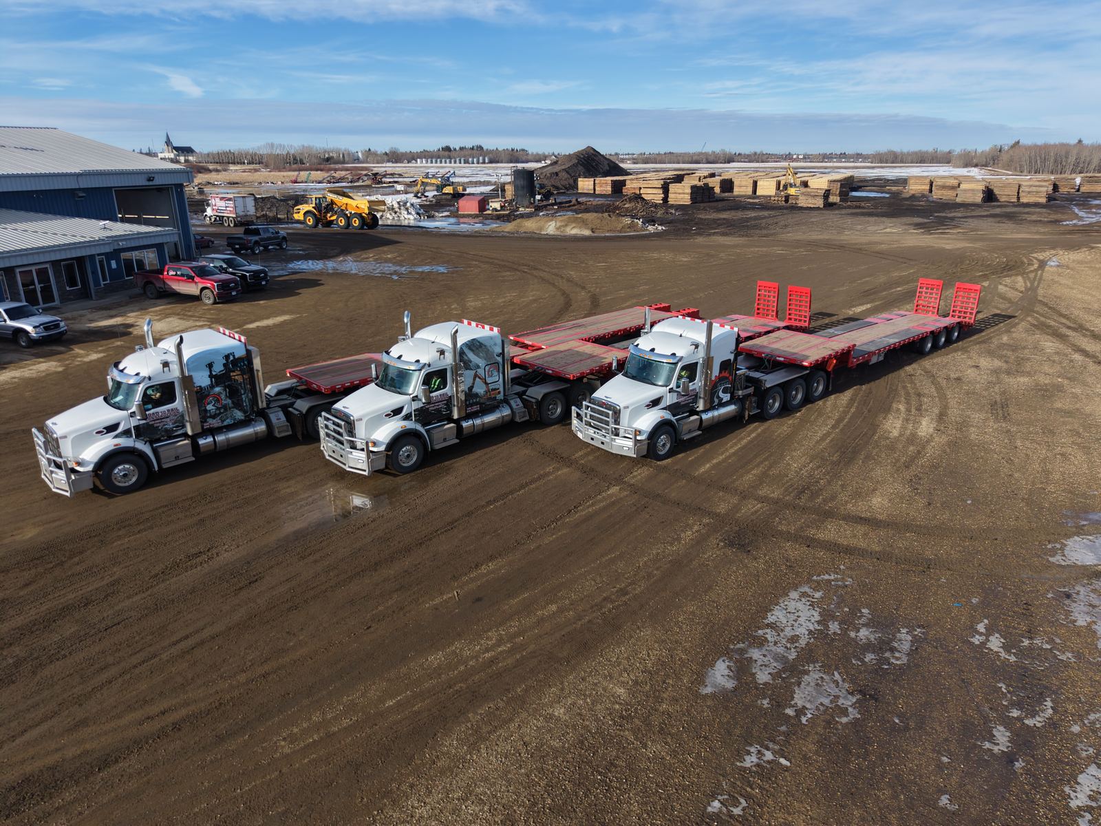 The trucking fleet staged in the yard