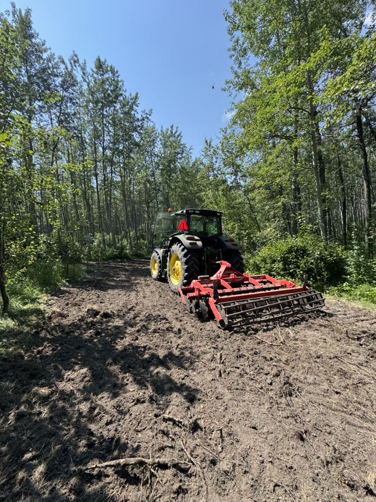 Tractor discing for soil conditioning during reclamation